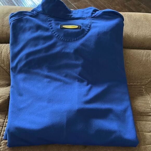 Greg Norman Wind/Waterproof 1/4 Zip Shortsleeved Pullover. XL - Picture 8 of 9
